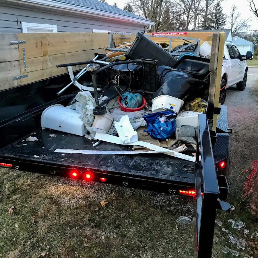 Roll-off dumpster delivered to a residential driveway in Portage