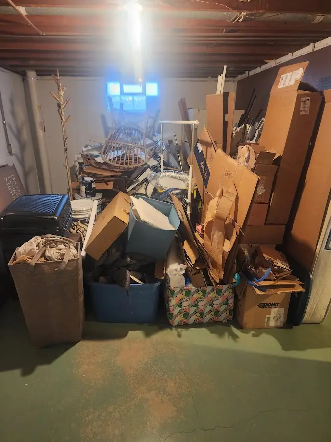 Roll-off dumpster container at job site for Yard Waste Dumpster Rental in Portage